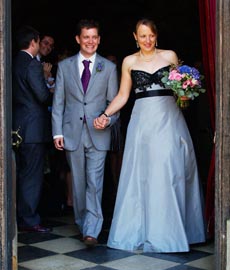 long, elegant blue and black sleeveless wedding dress